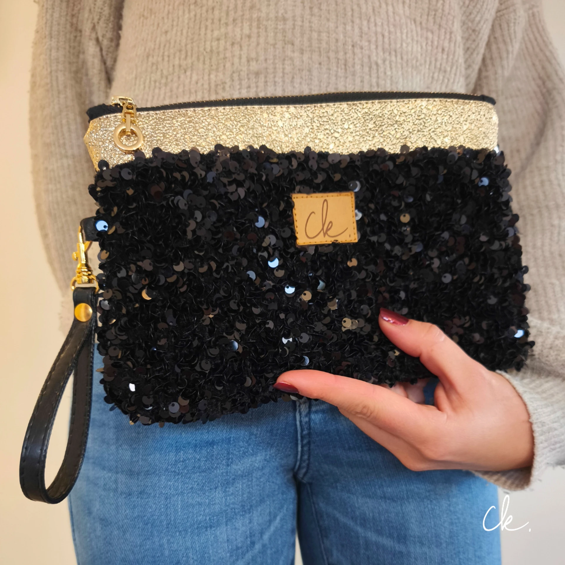 pochette Beli noir doré